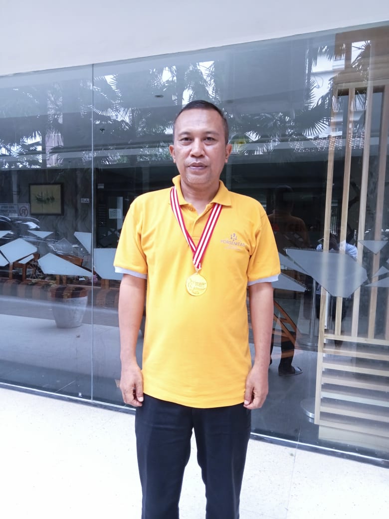 Arie Ferdana UPTD Keuangan Cihaurbeuti Raih Medali Emas di PorsanitasKe-IX Pangandaran.